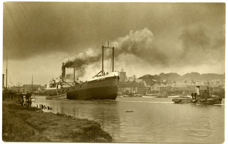  MAINDY TRANSPORT leaving Wivenhoe. 
Built by Forrestt Yard No. 1309 Official No. 143513 completed 1920. Renamed AMBLESIDE, LIVONIA-1933, LYNG-1936. 10 Dec 1942 sunk after convoy collision.

Photo by Oscar Way, Colchester 
Cat1 [Not Set] Cat2 Places-->Wivenhoe-->Shipyards