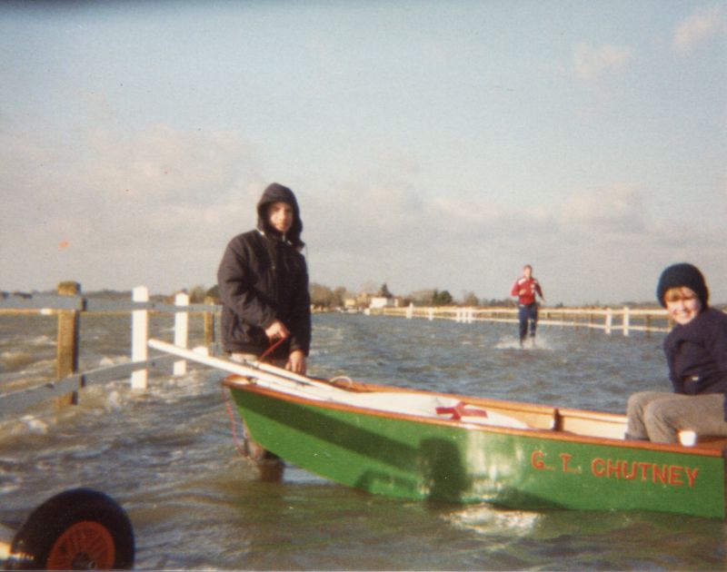  High tide at the Strood. Barnaby and Amy Smith. Note the jogger in the background. 
Cat1 Yachts and yachting-->Sail-->Small yachts / dinghies Cat2 Mersea-->Strood Cat4 Dabchicks