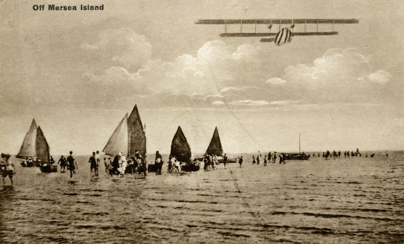  Off Mersea Island. Postcard mailed 19 September 1931 to Miss Muriel Smith, Norbury. Another postcard titled Sheel Island has the same photograph but no aeroplane... 
Cat1 Mersea-->Beach