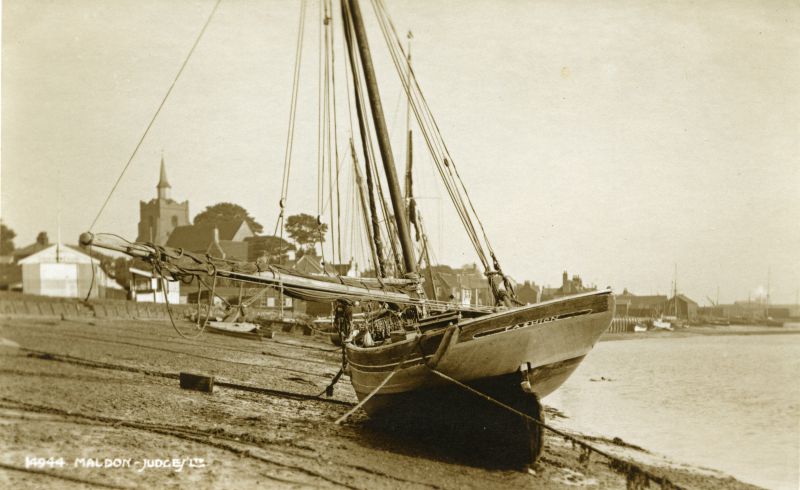  Smack FASHION on Maldon Promenade beach.

FASHION was built by Aldous at Brightlingsea in 1894, registered as CK428. In 1923 she was sold and reregistered as MN40. 1938 sold to Southend and reregisted as LO208. She is still sailing.

Photo taken late 1930s

For a full history see  ...
Cat1 Places-->Maldon Cat2 Smacks and Bawleys