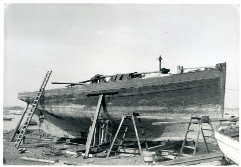  Tollesbury smack BERTHA on Wyatts slip 1962. Built by Aldous at Brightlingsea in 1888, sailed by the Redgewell family continued fishing for over 60 yrs. In 1960s sold to become yacht. Photograph taken during conversion. 
Cat1 Ship and boat building, sailmaking Cat2 Smacks and Bawleys Cat3 Mersea-->Old City & the Hard