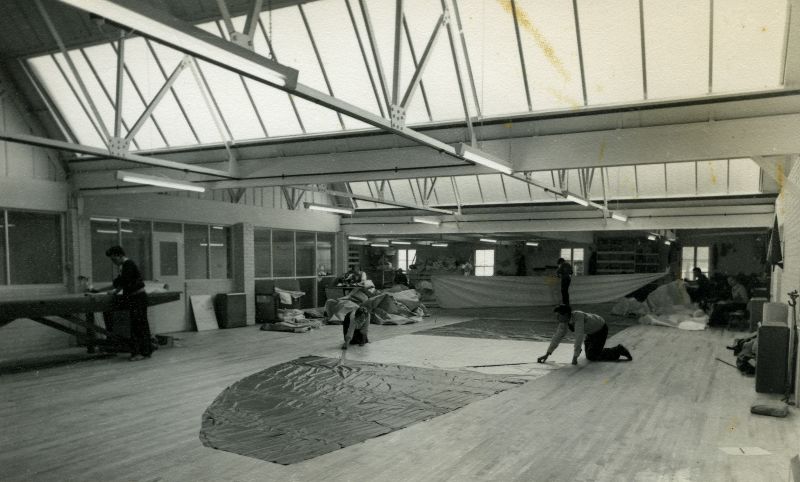  Gowens sailmakers. L-R Colin Anstey, Daphne Hewes (on floor). Claude Green (behind Daphne), Stanley French, John Wareing, George Freer (on floor), Ernie Ponder, Vic Pullen. 
Cat1 Ship and boat building, sailmaking Cat2 Families-->Hewes Cat3 Families-->Pullen Cat4 Mersea-->Shops & Businesses