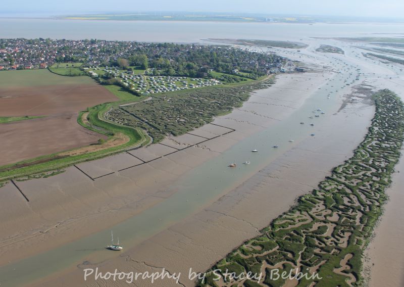  Strood Channel - view southwest.

Part of a collection of aerial views of Mersea taken by Stacey Belbin. If you are interested in purchasing any of these photographs, please contact Stacey at ladygraceboat.trips @ gmail.com 
Cat1 Aerial Views-->Mersea Cat2 Mersea-->Creeks, fleets, channels, saltings