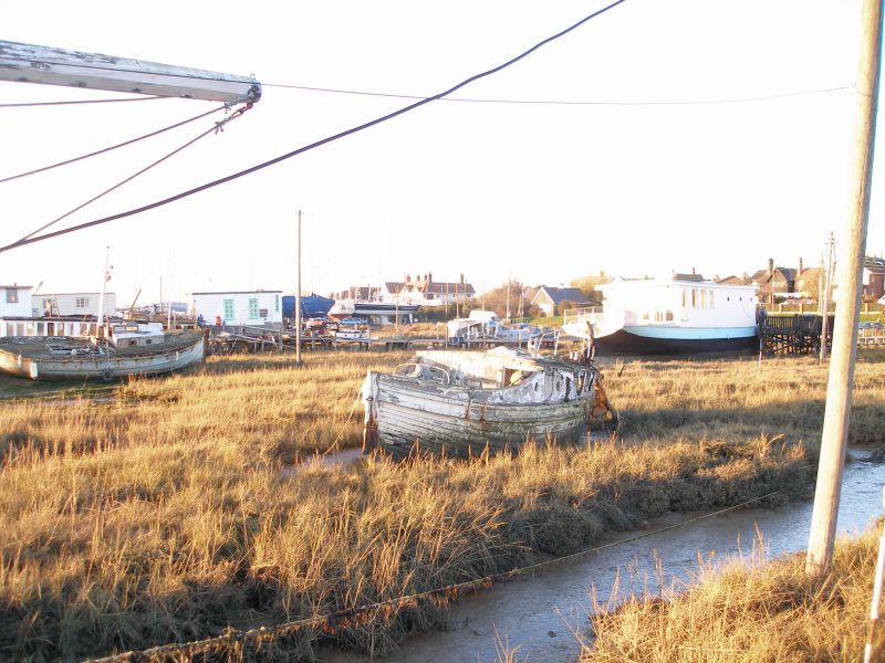  Houseboats at West Mersea. SCEPTRE is pulled up on to the saltings on the left. LORNA / VERA to the right. Victory Hotel distant centre. 
Cat1 Mersea-->Houseboats