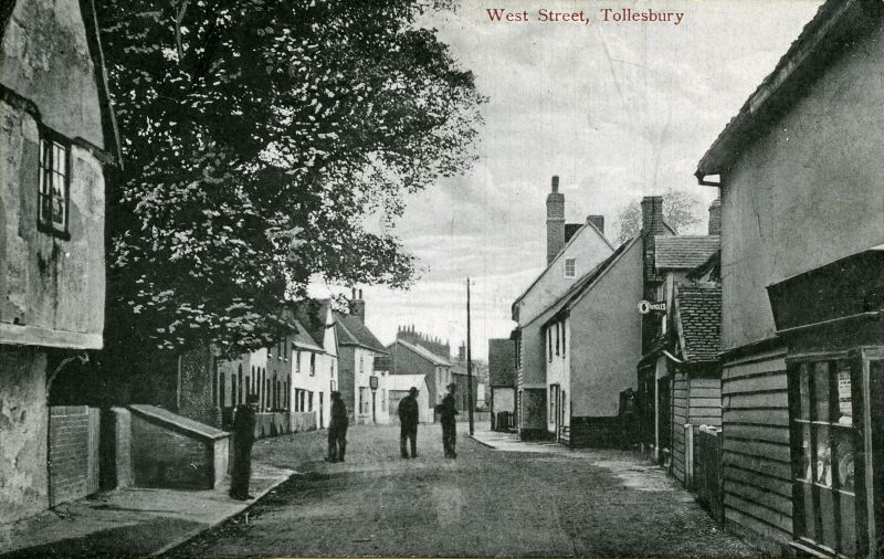  West Street, Tollesbury. Postcard mailed 23 May 1907.

West End Supply Stores on the right, burnt down June 1910. 
Cat1 Tollesbury-->Road Scenes