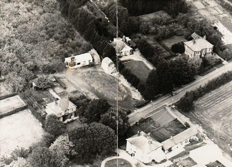 Click to Pause Slide Show


 Aerial view of part of East Road, West Mersea, looking northeast. Brierley Hall is lower centre. On the left is Mondamin, with Patricia Catchpole's stables next door. To the east of the stables is the bungalow Torbay and then the large house upper right was the Maples, owned by the Kemp family, and now demolished. 
Cat1 Mersea-->Buildings Cat2 Aerial Views-->Mersea