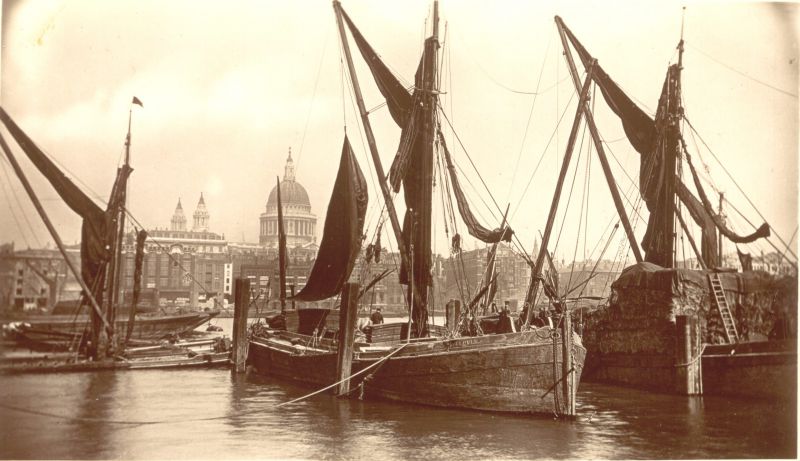  London River. Barge MAY FLOWER of Rochester under St Pauls. Postcard mailed 26Jan1914. Stackie on the right is possibly the ALBION. Beagles' Postcards. 
Cat1 Barges-->Pictures Cat2 Places-->Thames