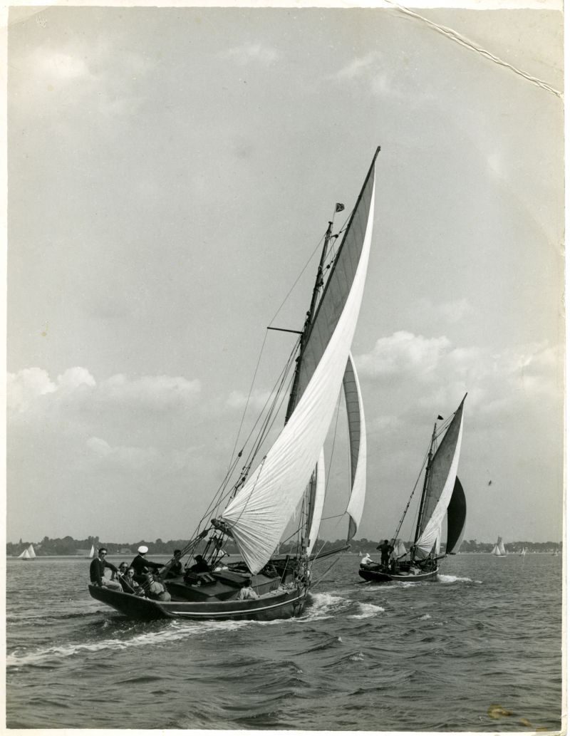 Click to Pause Slide Show


 Working smack leading converted smack at West Mersea Regatta about 1937. [DW]

A Mersea smack and a gaff cutter yacht, possibly converted from a smack, reaching along off West Mersea. The bow and quarter waves suggest that the craft are approaching maximum speed in this smooth water, urged on by bellying, loose-footed mainsails. The dredger sports a big jib.

The value of the counter ...
Cat1 Yachts and yachting-->Sail-->Larger Cat2 Smacks and Bawleys Cat3 Mersea-->Regatta-->Pictures