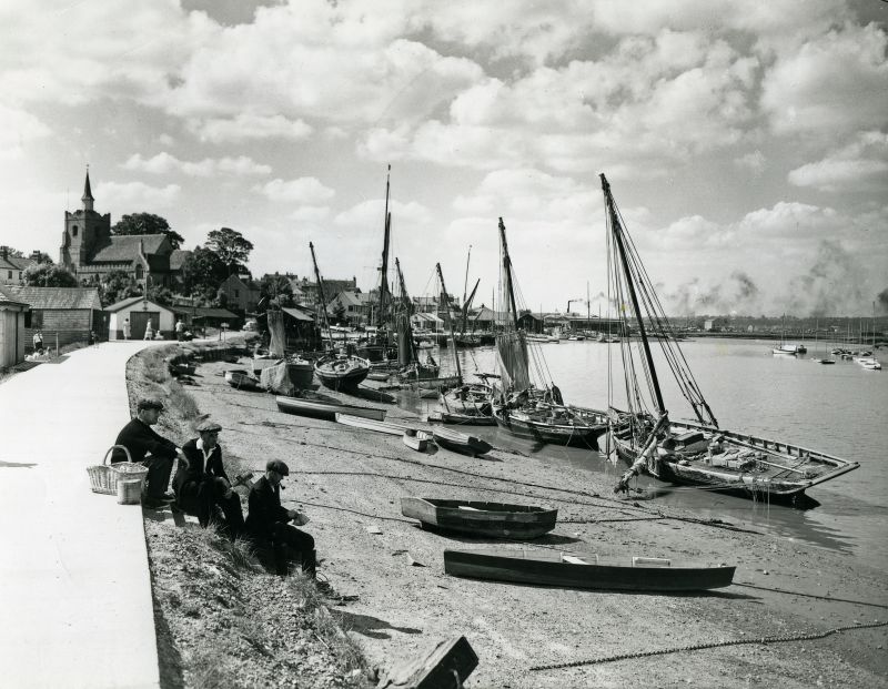  Maldon Hythe on a summer afternoon in about 1957. A glass plate by Douglas Went, used in The Sailors Coast, page 54, where John Leather writes:


Fully rigged auxiliary smacks line the waterside and an auxiliary barge waits to go on the blocks for refit at Walter Cook and Sons yard. A sailing barge from the mill lies beyond, against the town quay. Fishermen sit yarning on the river wall; men ...
Cat1 Smacks and Bawleys Cat2 Places-->Maldon