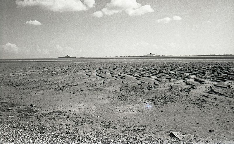 Laid up vessels in the River Blackwater, across the mudflats from West Mersea. Union Castle liners KENYA CASTLE and RHODESIA CASTLE.

KENYA CASTLE was in the river 22 April 1967 to 2 August 1967 and RHODESIA CASTLE from 4 May 1967 to 15 July 1967. Date: cJune 1967.