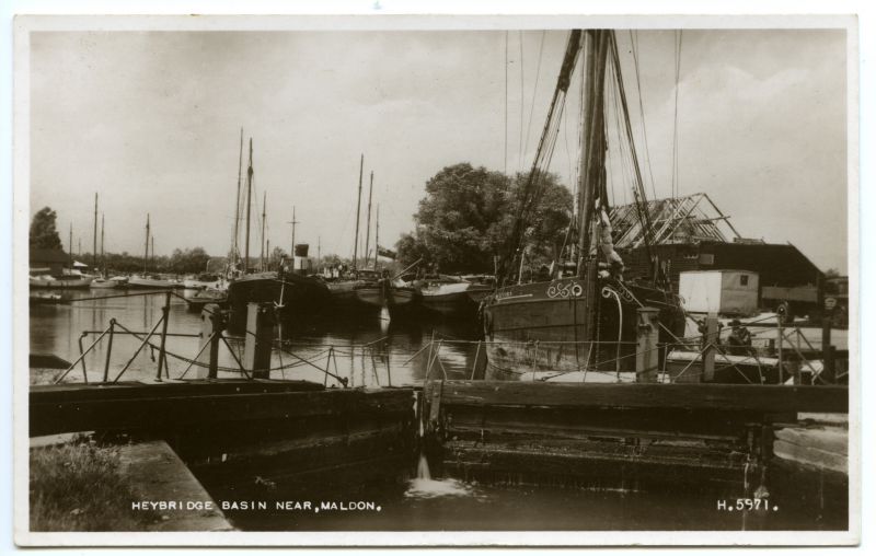  Heybridge Basin. Sailing barge VERONA on the right. Also UNIQUE, KEEBLE, ROSE lighters ?. Postcard H5971 postmarked 1949.

ROSE was sold to Brown as a lighter in 1936. Sold for housebarge in 1961 and became a hulk at Beaumont Quay, remains visible in 2012 [ Sailing Barge Compendium ]. 
Cat1 Barges-->Pictures Cat2 Places-->Heybridge
