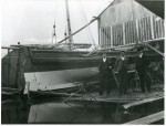 19. ID BF72_001_029_001 Rowhedge - 3 unknown men standing by Walton on Naze Volunteer Lifeboat. She is rigged for sailing and has no engine.
Cat1 Ship and boat building, sailmaking Cat2 Places-->Rowhedge
