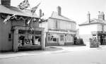 11. ID BJ10_009 Shops decorated for 1953 Coronation.
Cat1 Mersea-->Events Cat2 Mersea-->Shops & Businesses