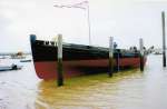  Launching of the Skillinger PIONEER CK18 at Brightlingsea 17 May 2003. This vessel had laid as a wreck at Mersea since the 1940s. She was retrieved from her muddy grave in Strood Creek and restored by local craftsmen to her former glory. - O.M. Fletcher June 2003.  MST_SMA_001