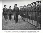 71. ID BOX005_009_P105 Girls of the Royal Observer Corps 18 group inspected by Air-Commodore Finlay Crerar, CBE (Commandant R.O.C.) at Birch aerodrome, on stand-down.
  From ...
Cat1 War-->World War 2 Cat2 Birch-->Events