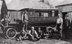  Osborne's first motor bus, Tollesbury. Pictured outside Maskell's blacksmith's shop in North Road. Richard Maskell adapted the body of a London horse-bus and put it on a model T-Ford chassis. Maskell, who put seven coasts of paint on any job he did, and mixed it himself, is pictured (extreme left) with members of the Osborne Family.
</p><p>Caption from More from Tollesbury Past by Keith Lovell, figure 86.  KBC_TOL_041