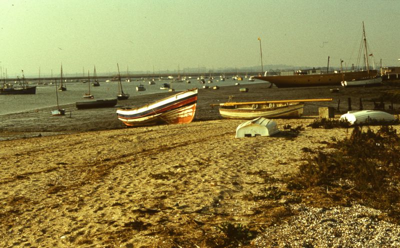 Click to Pause Slide Show


 Boats drawn up at the western end of Mersea beach, by Besom Creek. The boat in the centre is a coble - from the north east. 

The houseboat ARTEMIS is promonent on the right. Known locally as Bentley's houseboat, she was a wooden yawl built at Summers & Payne, Southampton in 1900, Official No. 113276. In 1938 she was bought by William Bentley, who ran an oyster restaurant in London. From ...
Cat1 Mersea-->Creeks, fleets, channels, saltings Cat2 Mersea-->Houseboats