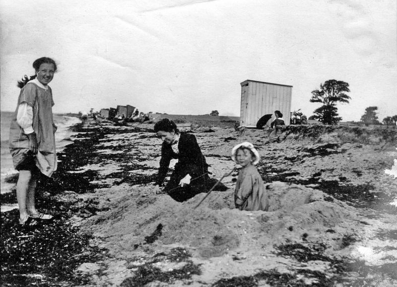  Vera, Emily and Hardie Weaver (in sun hat - born June 1910, so this picture is around 1913 ?). [Emily was wife of Leonard Weaver, mother of Vera (about 1902), Hardie, Ken (1912) and Peter (1916)] 
Cat1 Mersea-->Beach Cat2 People-->Other