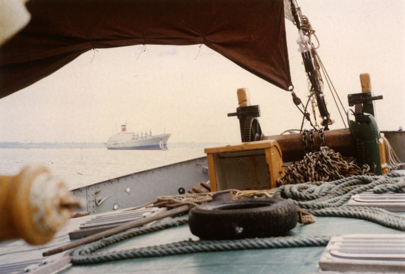 HARLECH in the River Blackwater, taken from sailing barge REMINDER, 8 Sept 1985. Date: 8 September 1985.