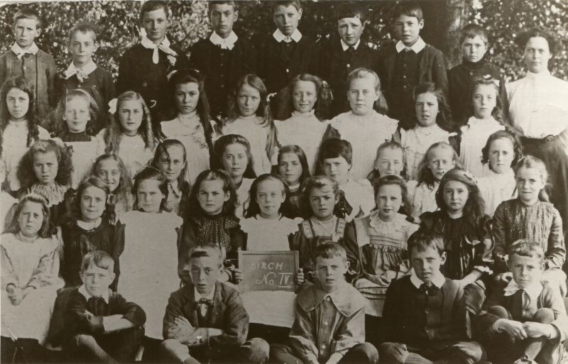  Birch School No. IV. c1914.

Teacher Miss Hutton.

Back row L-R 1., 2., 3., 4., 5., 6. Charlie Everitt, 7., 8.

Second from back 1. Gertie Taylor, 2., 3. May Bell, 4. Potter, 5. Whybrow, 6. Whybrow, 7. Ida Bond, 8. Flo Partner, 9.

Third from back 1. Edith Bambridge, 2. Violet Mead, 3. Nora Tosbel [born 1900], 4. May Pettican, 5. Ivy Sheldrake, 6., 7., 8., 9. Ettie ...
Cat1 Birch-->School