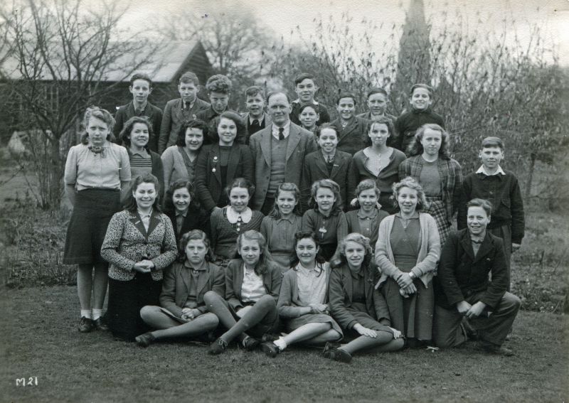  Birch School around 1950. 

Back row L-R 1., 2., 3., 4., 5. Cyril Everitt from Layer de la Haye (at the back),
 6., 7., 8., 9.

Second from back row 1., 2., 3., 4., 5. T.B. Millatt,
 6., 7., 8., 9. John Tatchell from Layer. 

Other names not yet known.

Photograph taken on the Round Lawn in the school gardens. The Science Room is in the background on the left. 
Cat1 Birch-->School