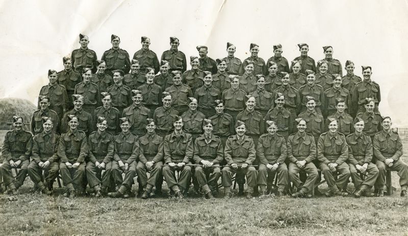  Royal Artillery at Mersea.

Thought to be 373 Coast Defence Battery, who were at West Mersea from July 1940.

Front row L-R 6. is Sgt. Major Harry [ Henry ] Conway - David Conway's father. He settled on the island and was a bus driver in later years.
7. U/O Charlton, 8. Capt. Mitchell, 9. 2/Lt Durrell.

Third row from front, L-R, 8. is thought to be Gnr. Noel Beadle - from Chris ...
Cat1 War-->World War 2