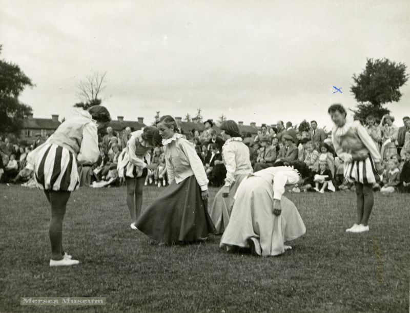 Click to Pause Slide Show


 1953 Coronation Pageant in the British Legion field. Bessie Dixon has an 'X' over her head. On the back of the photograph she wrote that Mrs 'Honan' Jones had trained them all and made all the costumes. The ladies were from the Womens Institute. 
Cat1 Mersea-->Events