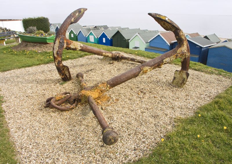  Old anchors resting along Victoria Esplanade at West Mersea. 
Cat1 Mersea-->Beach
