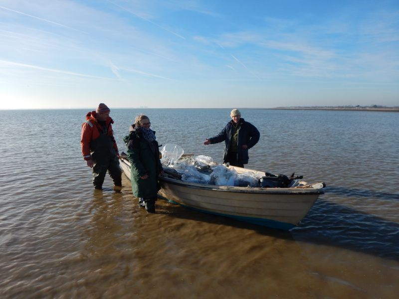  Recovering the board walk found in the mud off Coopers Beach. Safe in Mark Dixon's boat. 
Cat1 Mersea-->Beach
