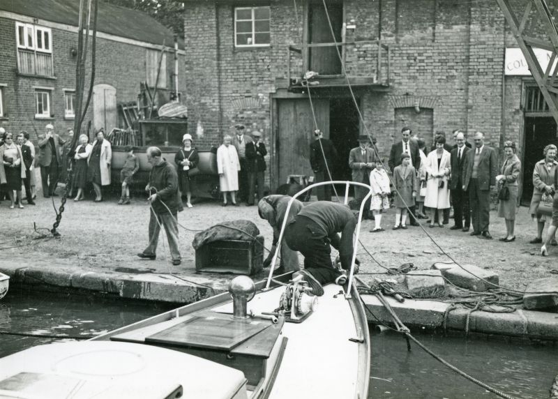  Launch of yacht JANMER, built for Norman Ward at Colne Marine [Guy Harding], Wivenhoe.

Murial Butcher, Emily Pullen, Ern Butcher, Rue Pullen, Ann Ward, Joan Ward, Norman Ward 
Cat1 Yachts and yachting-->Sail-->Larger Cat2 Places-->Wivenhoe-->Shipyards