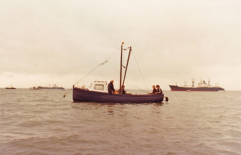 Fishing in the River. The laid up ships in the background are FLAMAR PRIDE and FLAMAR PROGRESS, which were in the River in 1981. The fishing boat and men are not yet known ... Date: cOctober 1981.