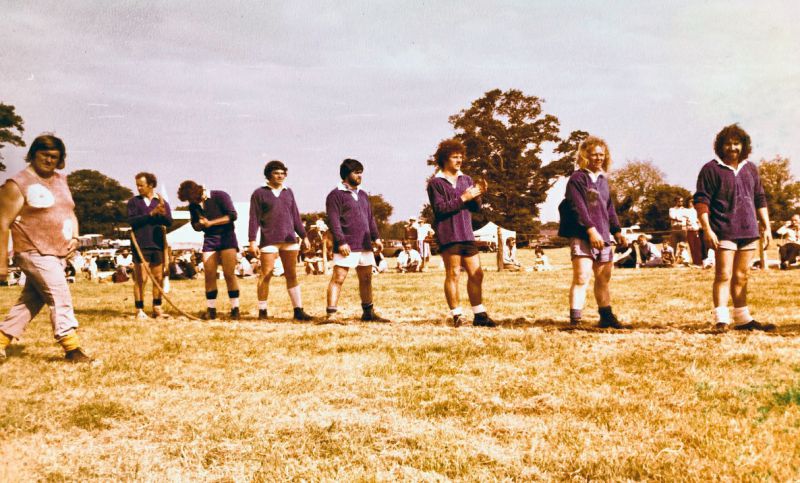  Peldon Plough Tug of War Team at Hanningfield Show. 1979 ?

Stepping in from the left is team coach on that day, Robert (Hoss) Gosling (R.I.P.) and then from left to right on the rope is. - ? -, John Hawes, Steve Vince, - ? -, - ? -, then there's Mick Cook and Alan Gordon. 
Cat1 Places-->Peldon-->People