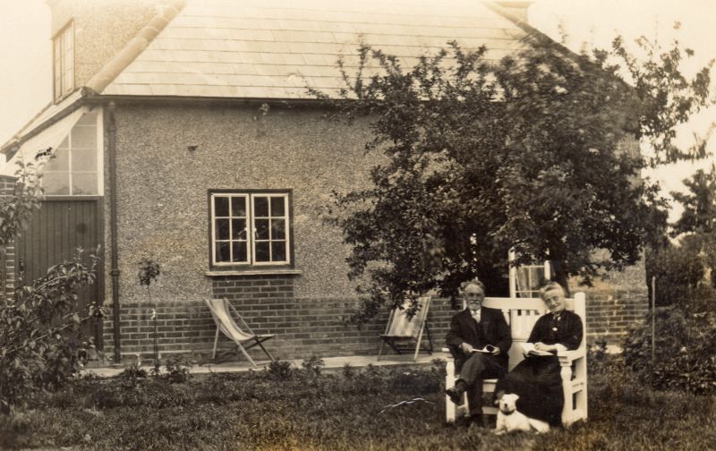 William Allen and his wife. This house stood in East Road, West Mersea. Sam Callow bought the house and had it demolished because it overlooked the Assembly Hall.

William Allen was an Estate Agent on Mersea, and Secretary of Mersea Island Fishermen's Co-operative Society Ltd. 
Cat1 Mersea-->Buildings