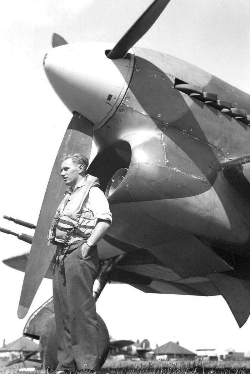  Ron Pottinger in front of a Hawker Typhoon at Manston in Kent. In March 1944 he was pilot of Typhoon R8895 which crashed in the River Blackwater. 
Cat1 War-->World War 2