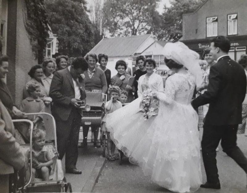  Helen Procter, married Bob Fitch at West Mersea Parish Church. White Hart.

Mrs Wright on the left with David Wright in pushchair lived by the Church, Mill Road. Pat French in the middle with glasses on. [Andy Greenleaf]

Also Betty Woolf (in front of open window) and Mrs Sales with pram [Ron Green] 
Cat1 Families-->Other