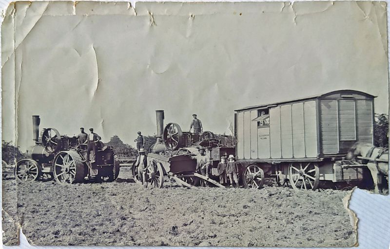  Arthur Polley and sons, thought to be harvesting around 1910 and working for Fairhead of Peldon. The living wagon has W.G. Fairhead Peldon on the side. Arthur Polley and family lived at Ardleigh and worked the traction engines for some time - Arthur is the great great grandfather of Helen Jones who sent the photograph.



William Golden Fairhead at Brick House Farm, Peldon had an ...
Cat1 Farming Cat2 Places-->Peldon-->Shops and Businesses