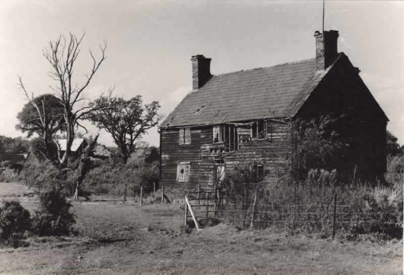  A derelict farmhouse, location unknown. There is a large farmyard in the distance to the left. 
Cat1 People-->Other