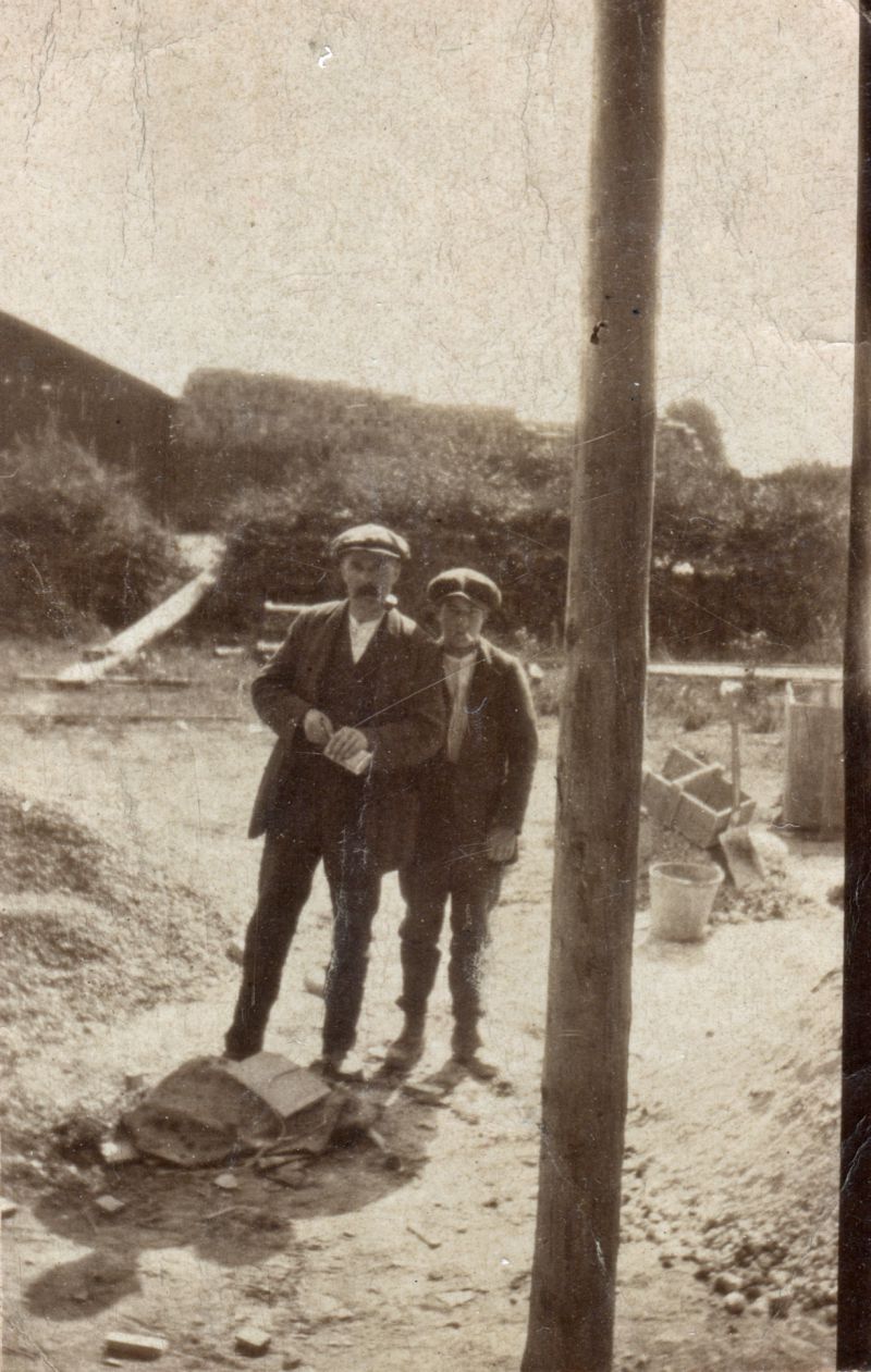  Arthur Barrett and Kenny Bacon who was doing his apprenticeship at the time. My dad Les Green did his apprenticeship with Arthur at Clifford White's and when it was finished he was stood off and Kenny was taken on in his place. The pole in the foreground would be a scaffold pole. [From Ron Green] 
Cat1 Families-->Other