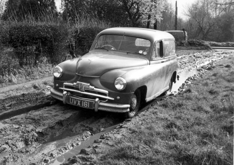  Alfie Pavey's milk delivery van - Standard Vanguard UVX161. He was based in the very muddy Suffolk Avenue.

Brian Jay used to work for Alf Pavey in 1952. Alf would collect the milk in churns from Knights Farm Peldon, and bottle it in the dairy in Suffolk Avenue. 
Cat1 Mersea-->Shops & Businesses Cat2 Mersea-->Road Scenes Cat3 Transport - buses and carriers