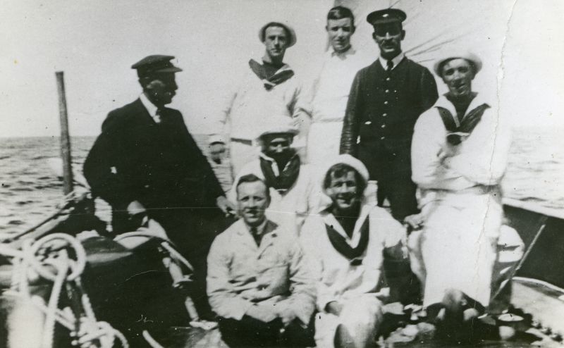  Captain Harry Pettican and crew of SUNSHINE.

L-R Captain Pettican, Harry Milgate, Syd Mills, Eric [sic] [Ernest] Appleton (Mate), Uriah Lewis.

L-R seated - Harry Redhouse, Peter Owen, Cliff Rice.

Caption has more names than the photograph.

The Book Tollesbury in the year 2000 says Captain Harry Pettican became skipper of the 70ft schooner SUNSHINE in 1908. She was owned by ...
Cat1 Yachts and yachting-->Sail-->Larger Cat2 People-->Fishermen and Seamen
