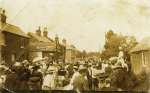 160. ID RG19_015 World War 1 Victory Celebrations at West Mersea. Looking up High Street with Yorick Road and the butcher's on the right.
Ron says the picture came to him ...
Cat1 Mersea-->Events Cat2 War-->World War 1