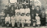  Birch School c1920
 Back row L-R 1. Raymond Bond, 2. Jack Howard, 3. Cyril Olley, 4. Tubby Taylor, 5. Ken Vince, 6.
 Middle row 1. Phillip Taylor, 2. Kitch Playle, 3., 4. Ivy Moore, 5. Marty Everitt, 6. Ned Brewer, 7. Gordon Studley, 8. Cecil Norfolk, 9. Myrtle Harvey.
 Front row 1., 2. Joyce Borley, 3. Gwen Gower, 4. Syble Speller, 5. Phyllis Manning, 6. Lily Symonds, 7. Jack Speller.
 Photograph 13.  ELB_SCH_111