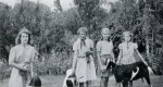  Some Members of the Young Farmers Club : 1946. From Birch School 1847-1947.
 School garden in background.
 L-R 1. Margaret Cresswell, 2. Stella Woods, 3. Janey NYLOR, 4. Jean Fisher.  TBM_BCS_039_002
