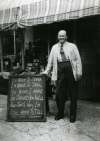  Oscar Whiting outside his shop. You could always rely on a different rhyme.
 From Album 11.  FL11_028_001
