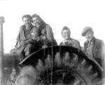  Land Girls Edna Smy née Dallas, Rose, Emmy, Bunny Webb or Bunny Reynolds (tractor driver) working near Peldon Rose 1942  DIS2008_WLA_129