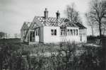  Kemps Farm Bungalow under construction, Peldon.
</p><p>
This bungalow was built at the beginning of 1946. I had left school and was due to start work with builder Clifford White. As my dad and others were working on the bungalow I had to wait a short while until the next job could be started, a bungalow next to Fen Farm, East Mersea.
 
Kemps Farm bungalow had stood somewhere on the East coast and was taken down because of erosion. Building materials were in very short supply at that time because of the War so I suppose this was a very good way of getting a new home.
[Ron Green]</p>  PH01_KSF_121