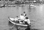 11746. ID RG27_327 WMTR Watersports. Ted Woolf sitting, Peter French standing, John Chatters, Harold Cutts in stern
Cat1 Mersea-->Regatta-->Pictures