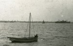 Part of a postcard of West Mersea beach. PHILOCTETES is on the right.