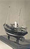  ESSEX MAID was built by Rowhedge Ironworks in 1939. This model is undated but it is thought it was built before the vessel was completed - it does not have the Port of Registry of Colchester on her stern, whereas a launch-day photograph of the vessel shows 'Essex Maid, Colchester'.
 The model flies the defaced Blue Ensign of the Royal Corinthian Yacht Club, of which that John Blott was a member for many years.  JBL_RIW_053