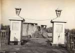  Entrance gates under construction. Timber stored in yard. Location not known. A puzzle picture...  UPA_003_001